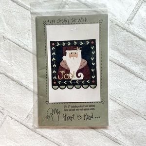 Pattern for Joyful St. Nick wall hanging quilt with wool applique